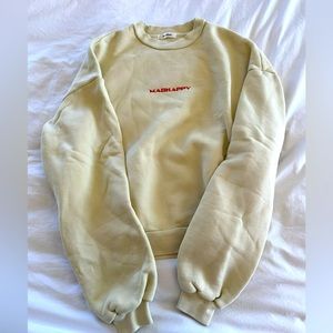 Soft yellow Madhappy sweatshirt